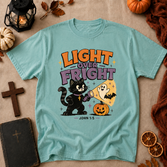 Light Over Fright Halloween T-Shirt — Cute Cat & Ghost Pumpkin Graphic (John 1:5)