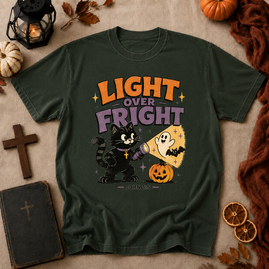 Light Over Fright Halloween T-Shirt — Cute Cat & Ghost Pumpkin Graphic (John 1:5)