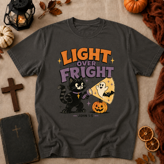 Light Over Fright Halloween T-Shirt — Cute Cat & Ghost Pumpkin Graphic (John 1:5)