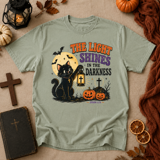 Halloween Cat T-Shirt — "The Light Shines in the Darkness" Vintage Christian Pumpkin Tee
