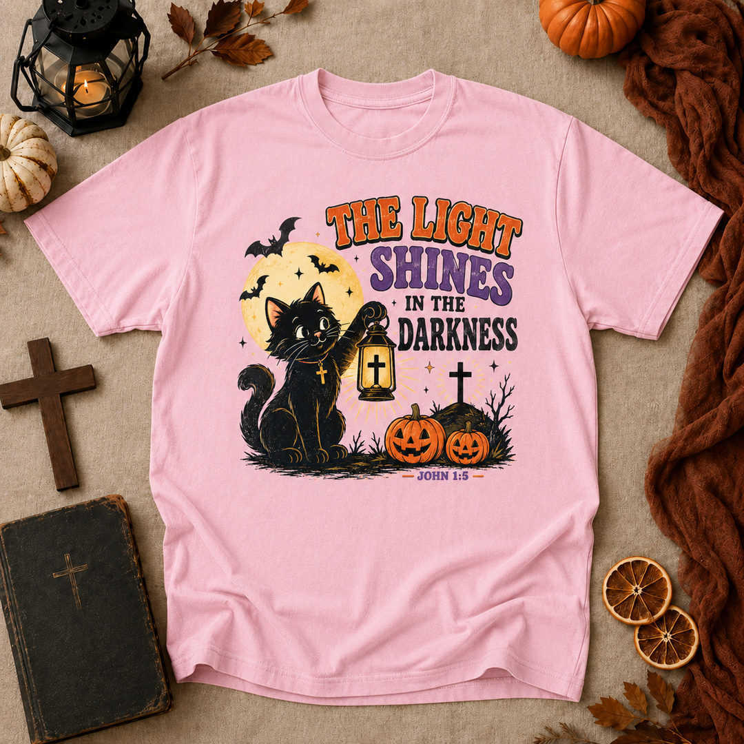 Halloween Cat T-Shirt — "The Light Shines in the Darkness" Vintage Christian Pumpkin Tee