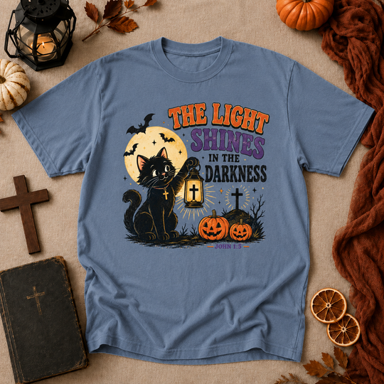 Halloween Cat T-Shirt — "The Light Shines in the Darkness" Vintage Christian Pumpkin Tee