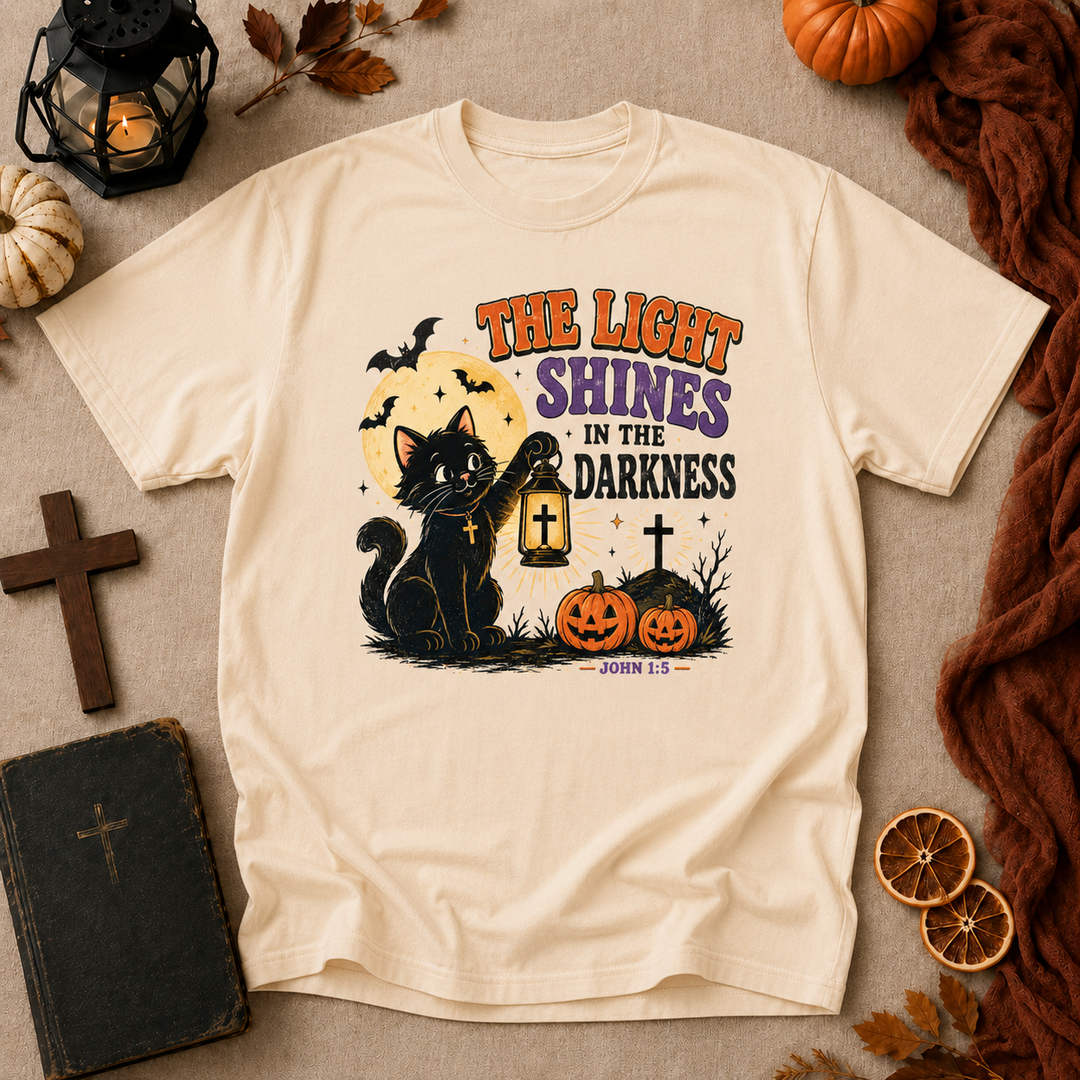 Halloween Cat T-Shirt — "The Light Shines in the Darkness" Vintage Christian Pumpkin Tee