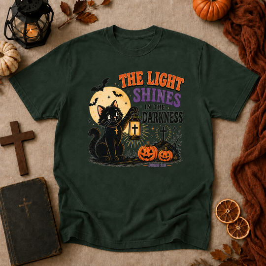 Halloween Cat T-Shirt — "The Light Shines in the Darkness" Vintage Christian Pumpkin Tee