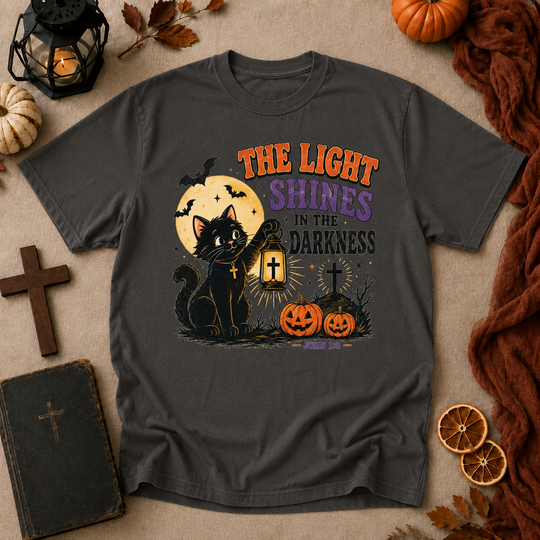 Halloween Cat T-Shirt — "The Light Shines in the Darkness" Vintage Christian Pumpkin Tee